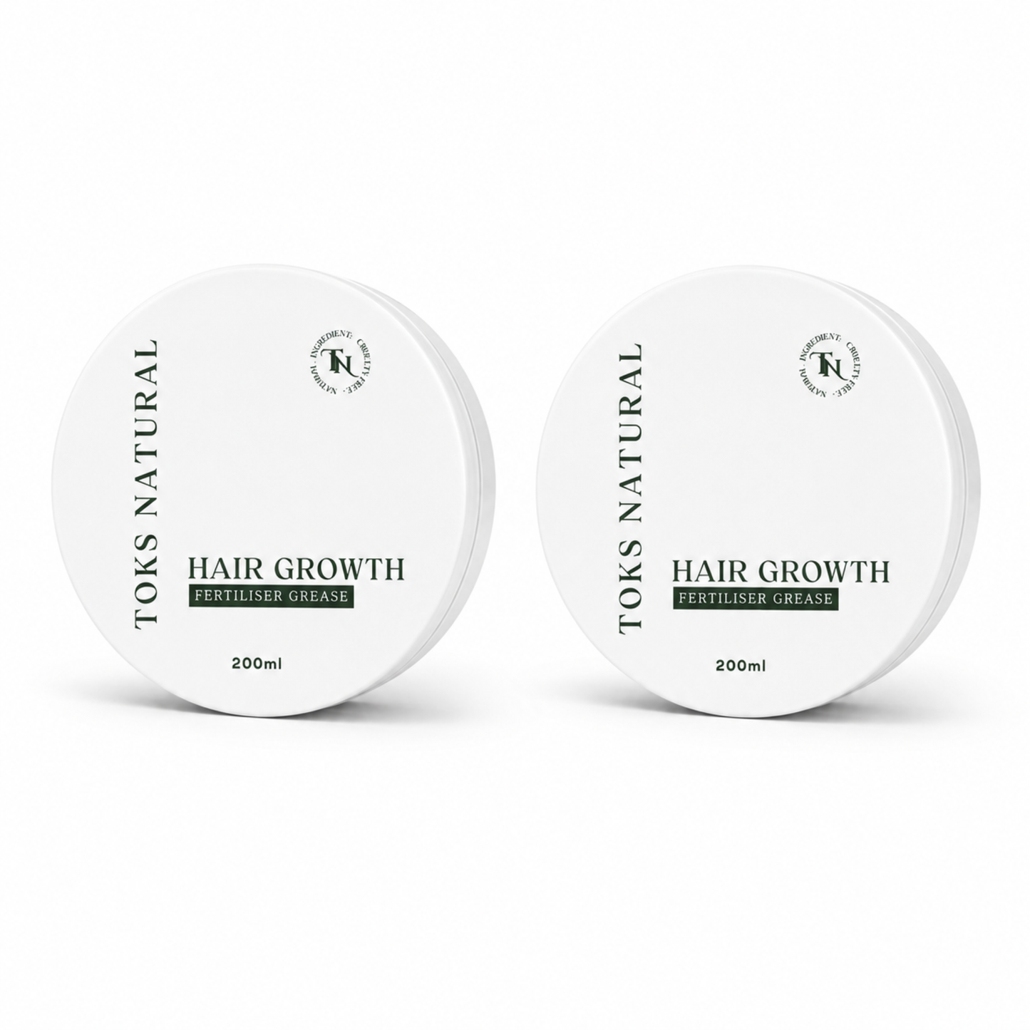 Two containers of Toks Natural Hair Growth Product on a white background