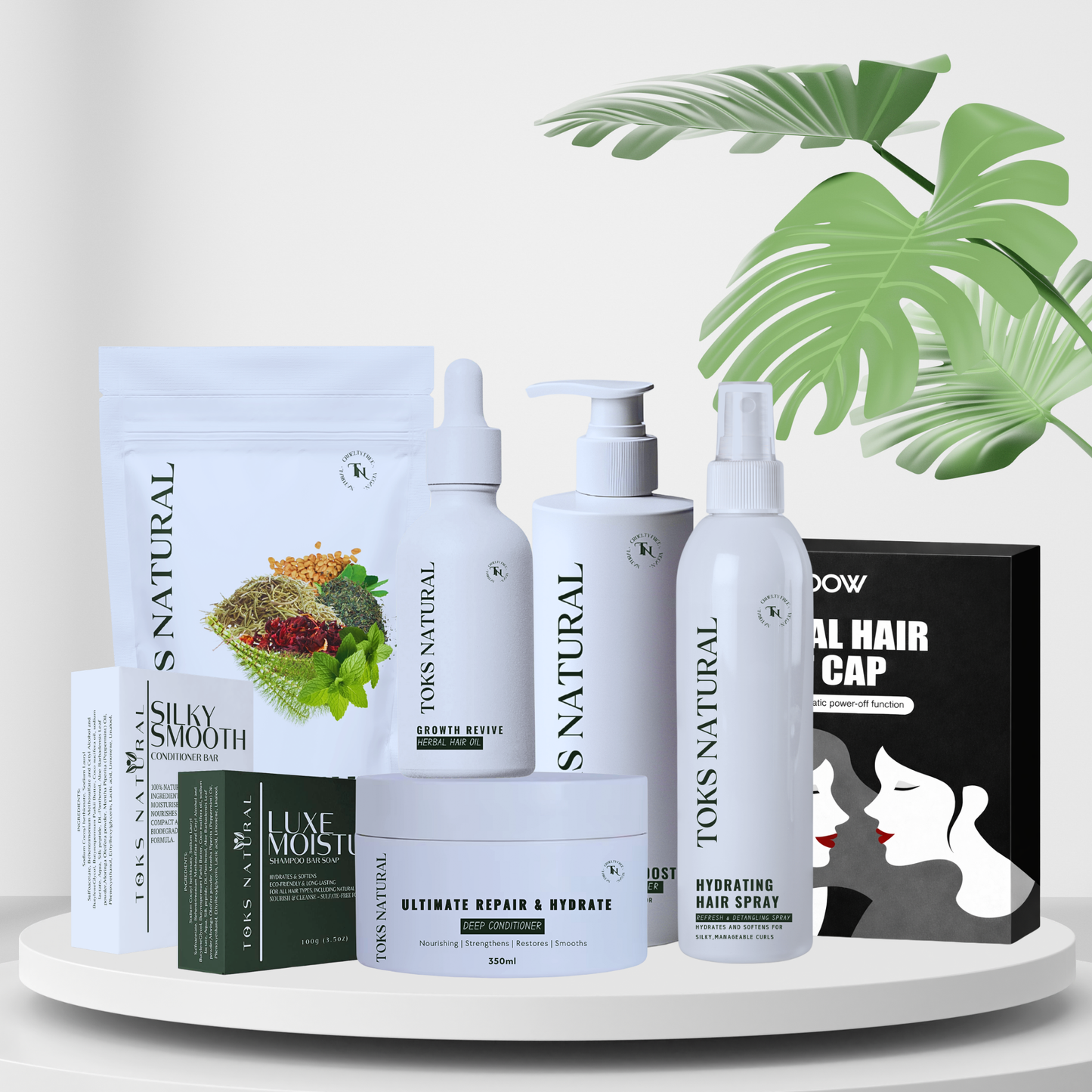 Collection of TSN Natural hair care products on a white surface with a green leafy plant in the background.