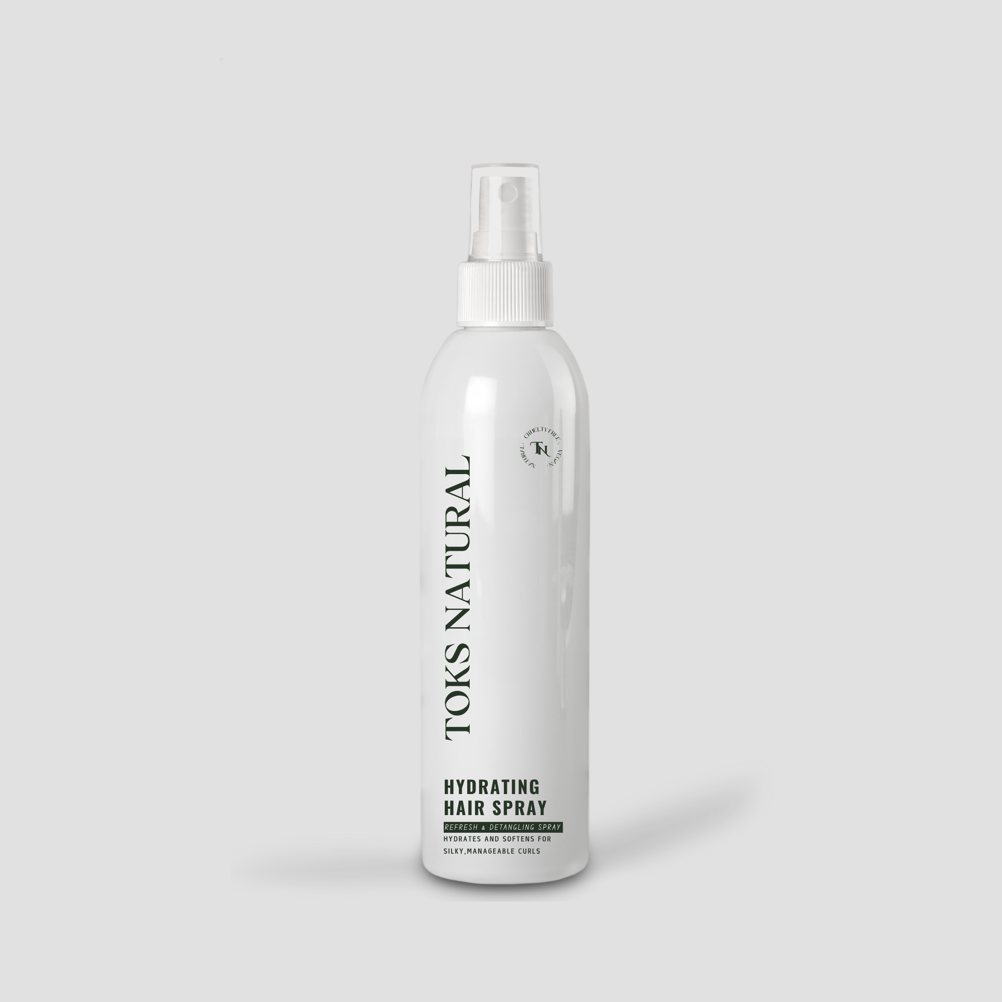 Toks Natural hydrating hair spray bottle on a light gray background