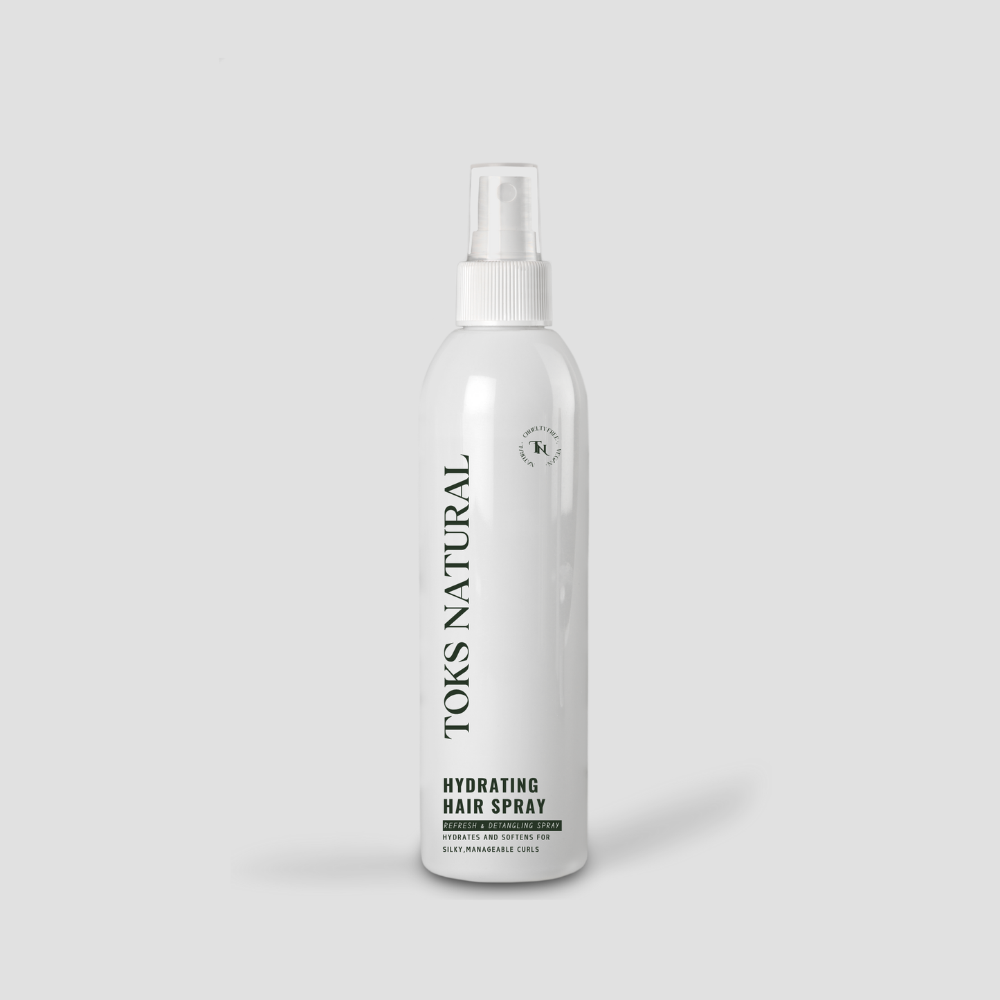 Toks Natural hydrating hair spray bottle on a light gray background