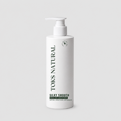 Red KeraSys conditioner bottle with pump on a white background