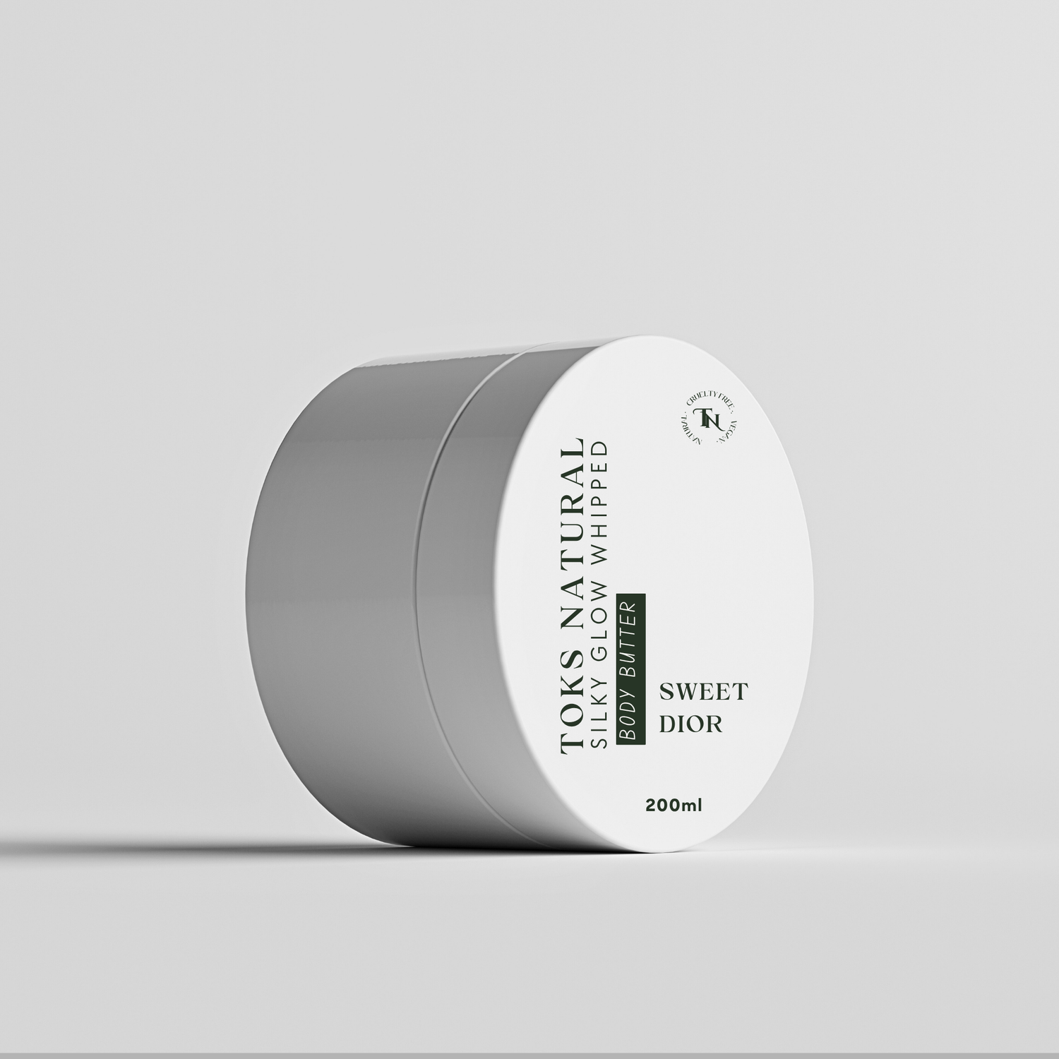 TOKS Natural body butter container on a light gray background