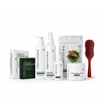 Toks Natural hair care product set including bottles, a jar, a brush, and packaging on a white background