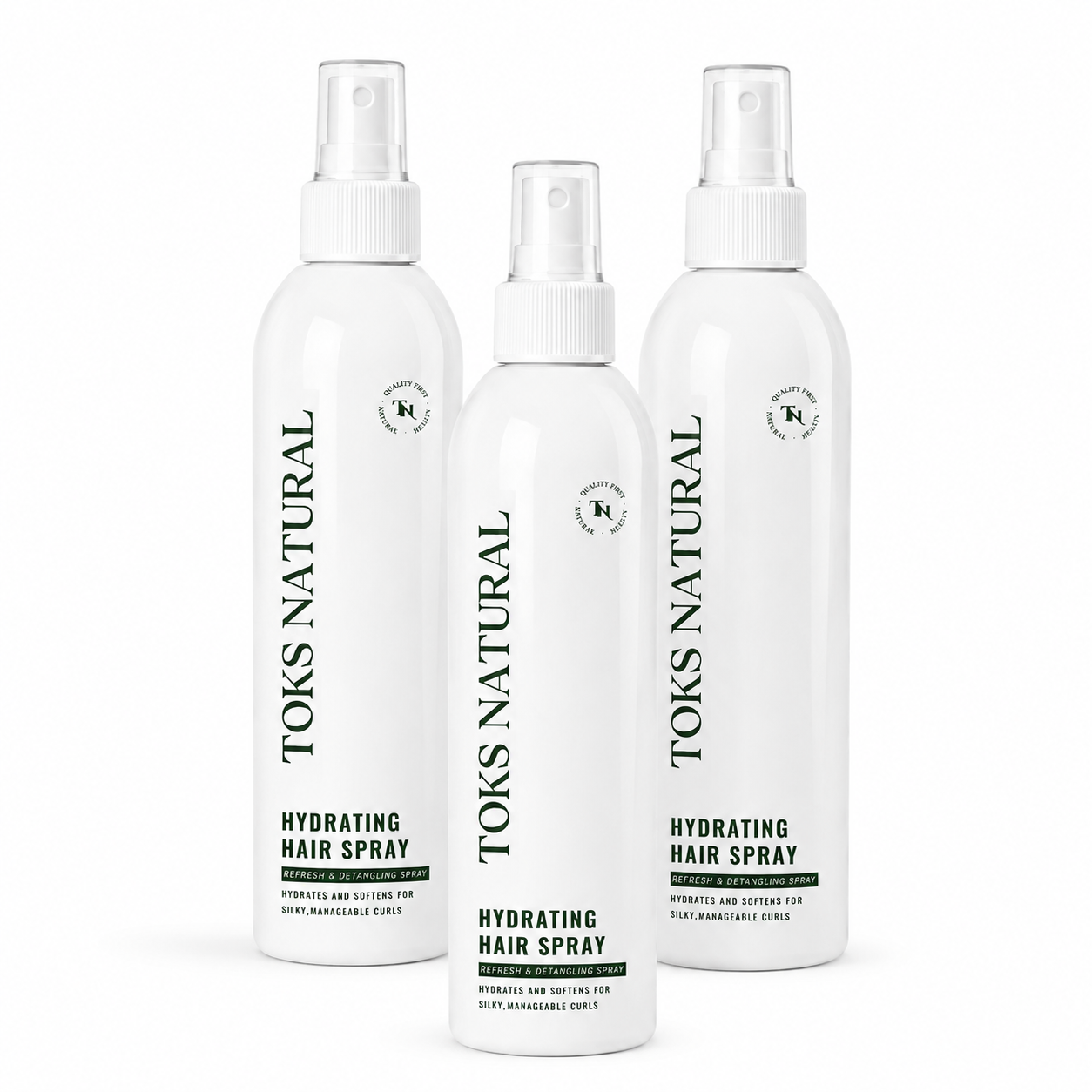 Three bottles of Toks Natural hydrating hair spray on a white background