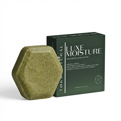 Green shampoo bar with packaging labeled 'Luxe Moisture' on a white background