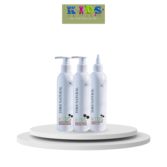 Three bottles of Kids Natural hair care products on a white platform with a colorful logo in the corner.