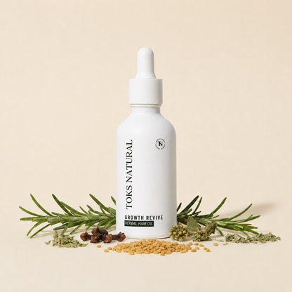 TOKS NATURAL Growth Revive Herbal Hair Oil bottle with herbs on a beige background