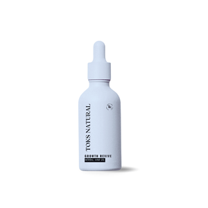 Toks Natural skincare bottle on a white background