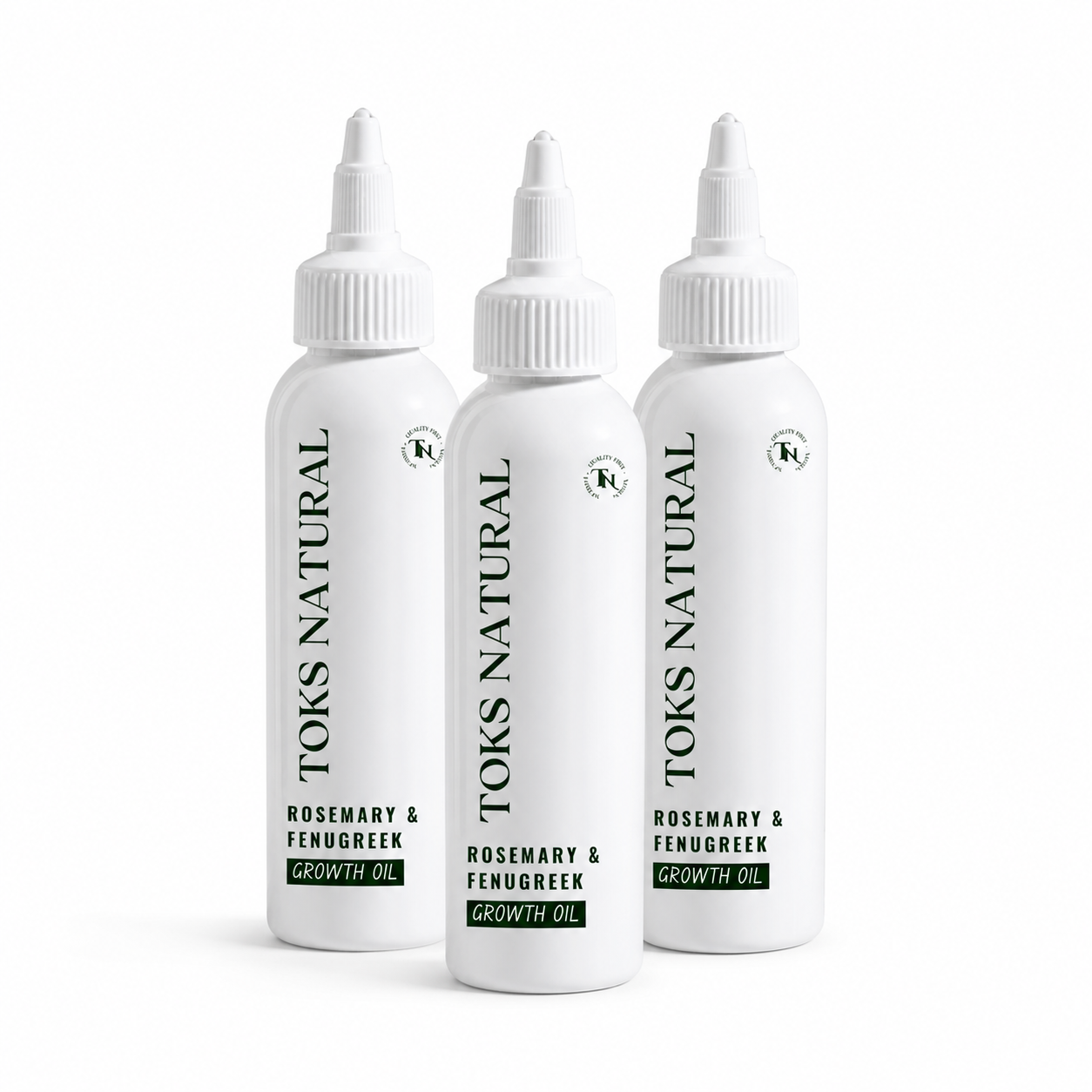 Three bottles of Toks Natural Rosemary & Fenugreek Growth Oil on a white background
