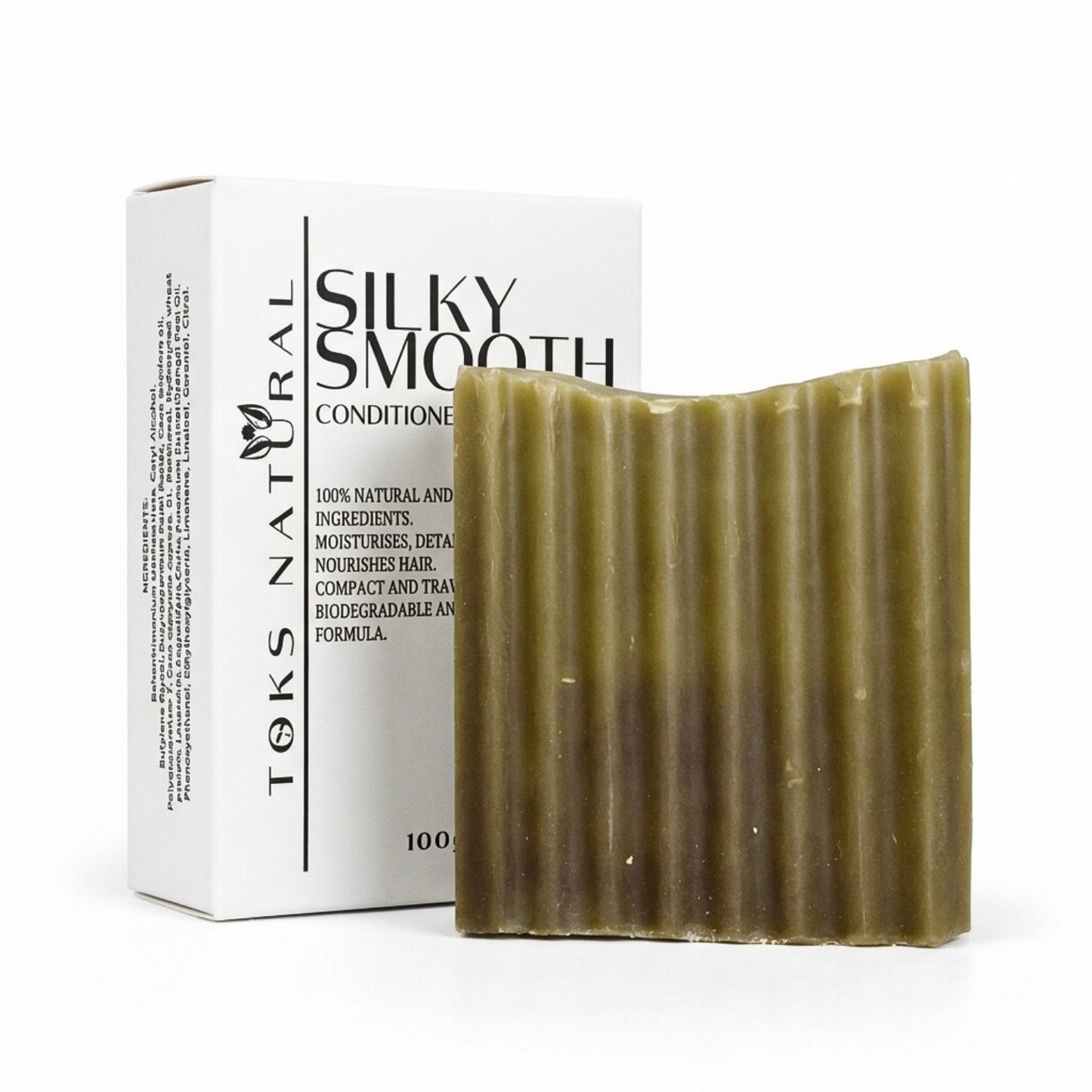 Bar of soap with a Teks Natural box on a white background