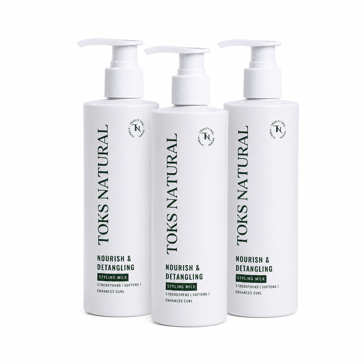 Three bottles of Toks Natural Nourish & Detangling product on a white background
