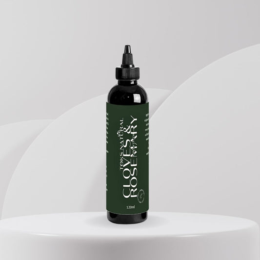 Non-greasy hair oil with clove and rosemary for thicker, stronger hair