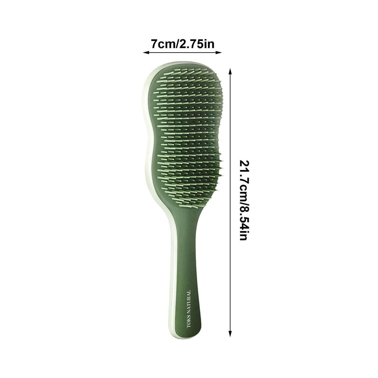 Green hairbrush with measurements on a white background