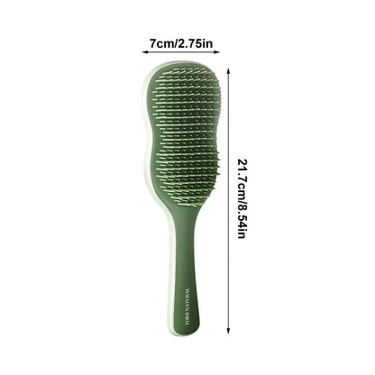 Green hairbrush with measurements on a white background