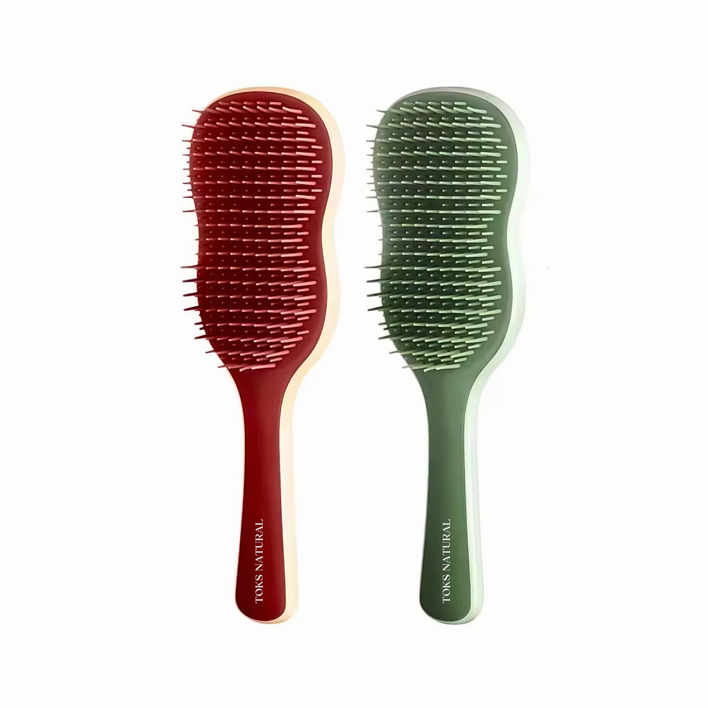 Two hairbrushes, one red and one green, on a white background with 'Tous Natural' branding.