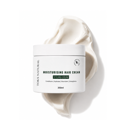 A white jar of Toks Natural Moisturising Hair Cream styled with a swirl of the cream behind it on a clean white background.