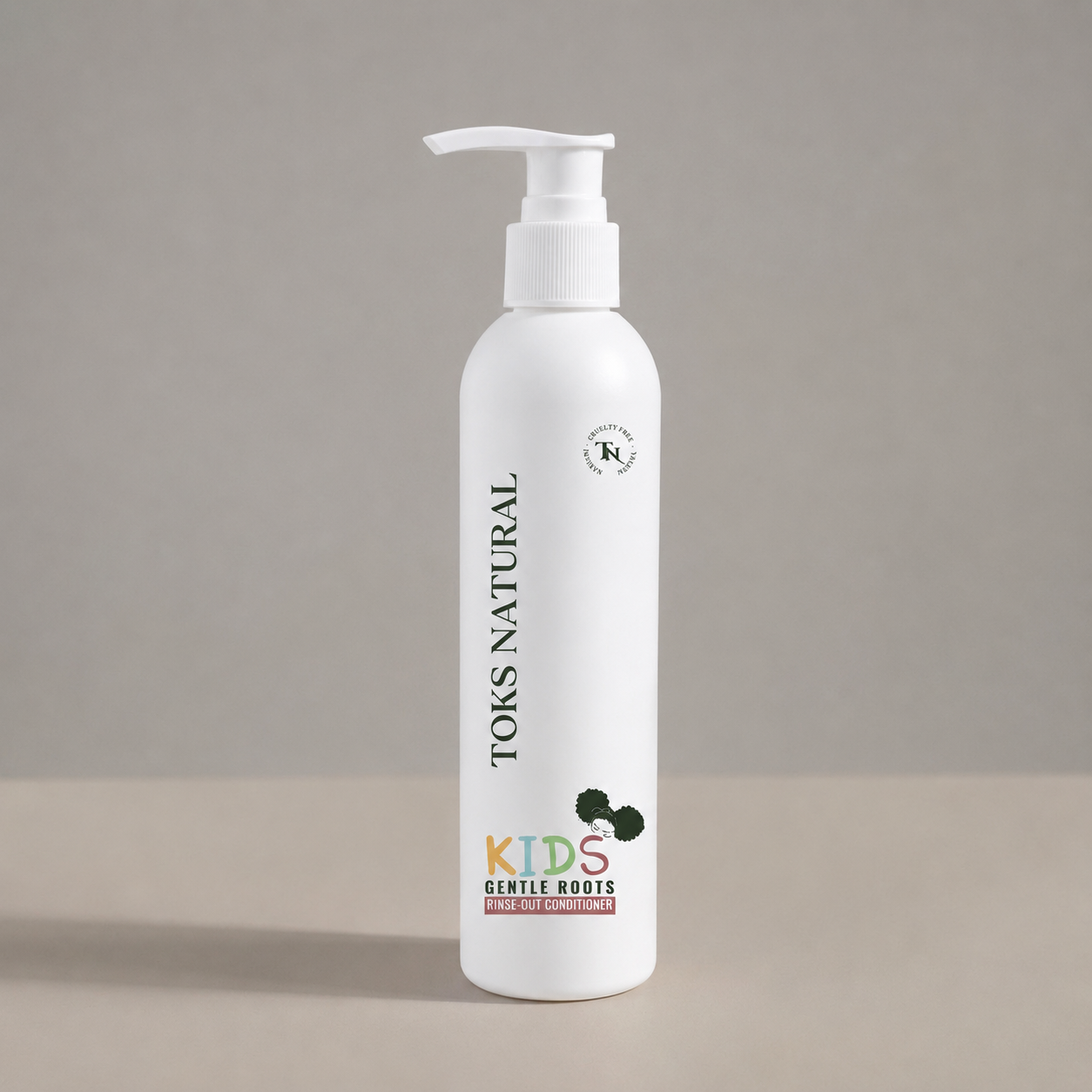 White bottle of TOKS Natural Kids Gentle Roots product on a gray background