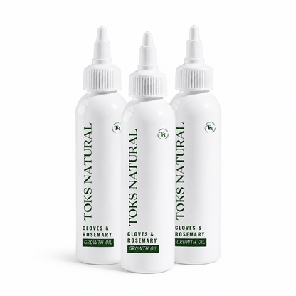 Three bottles of Toks Natural Cloves & Rosemary Growth Oil on a white background