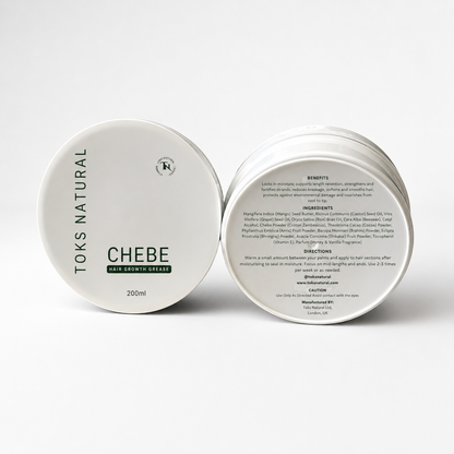 Two containers of Toks Natural Chebe hair growth grease on a white background