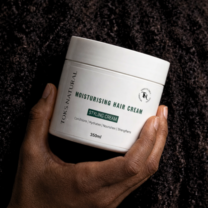 Moisturising Hair Cream (Styling Cream) near his face against a soft neutral background.