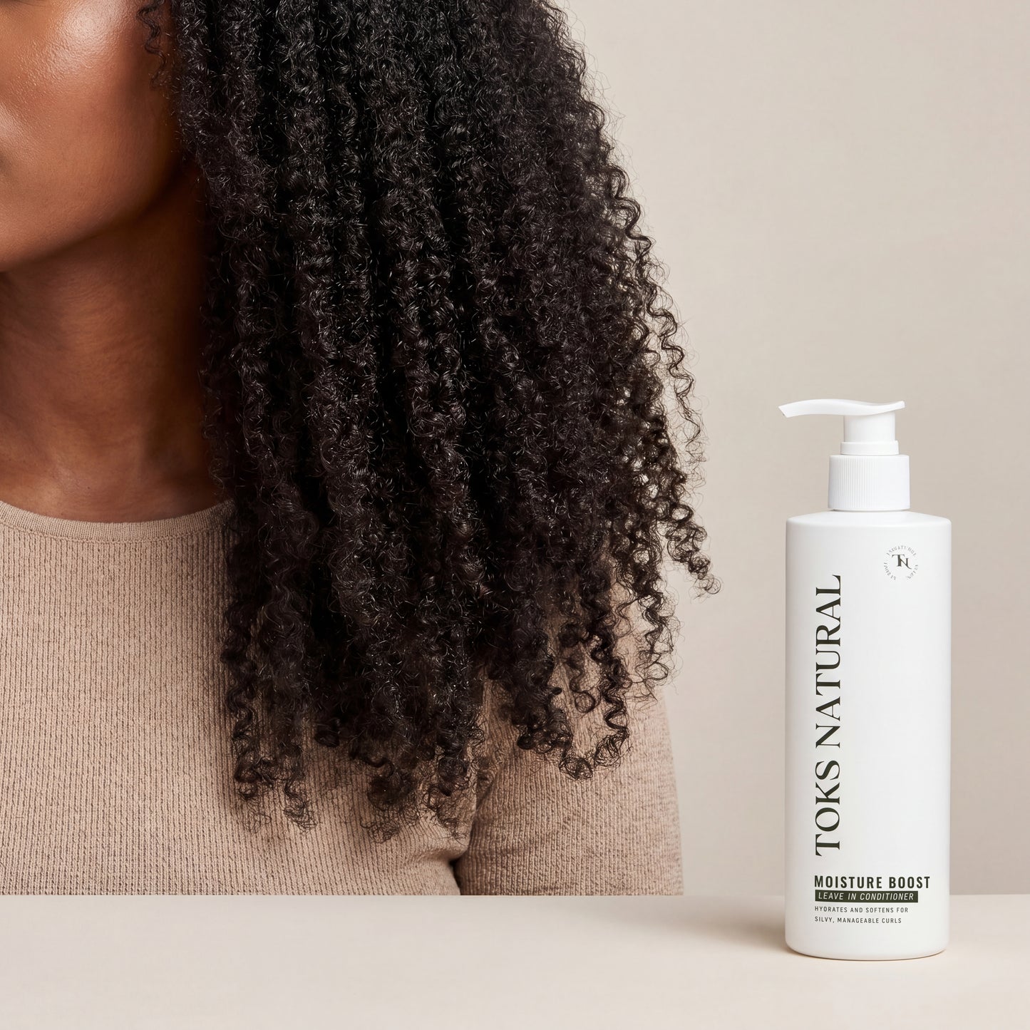 Woman with curly hair next to a bottle of TOKS NATURAL product on a beige background