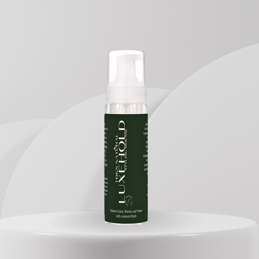 LuxeHold Hair Styling Mousse bottle with Aloe Vera, Hydrolyzed Wheat Protein, and Glycerin, handmade for weightless volume and flexible hold.