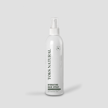 Toks Natural hydrating hair spray bottle on a light gray background